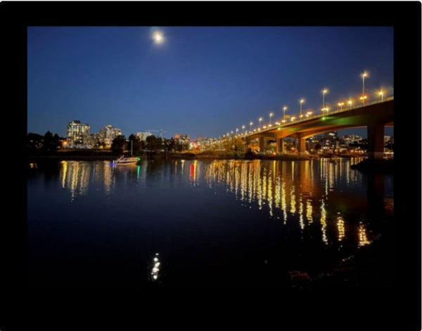 Cambie Bridge in Vancouver at night under the moonlight